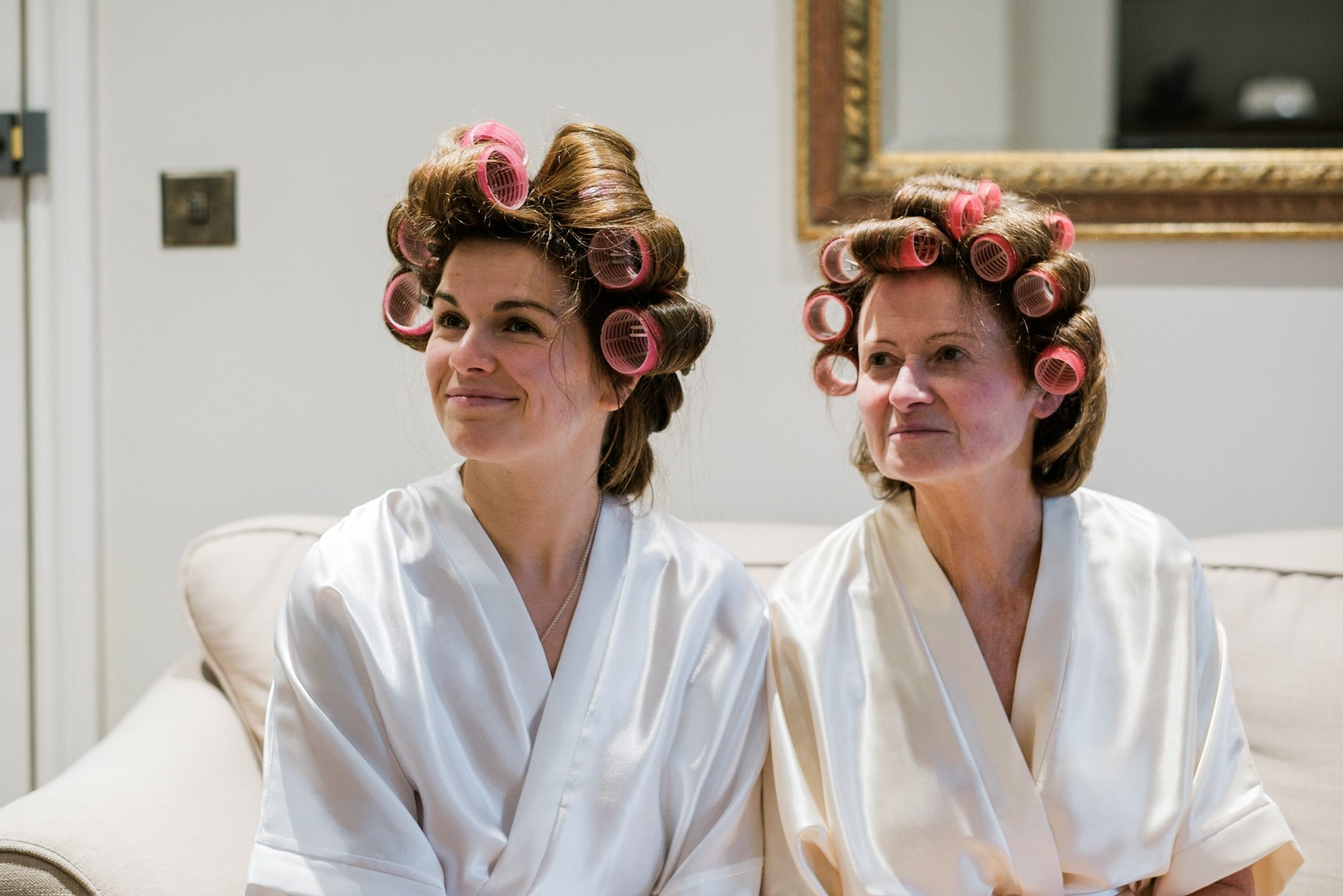 bride and her mother in curlers
