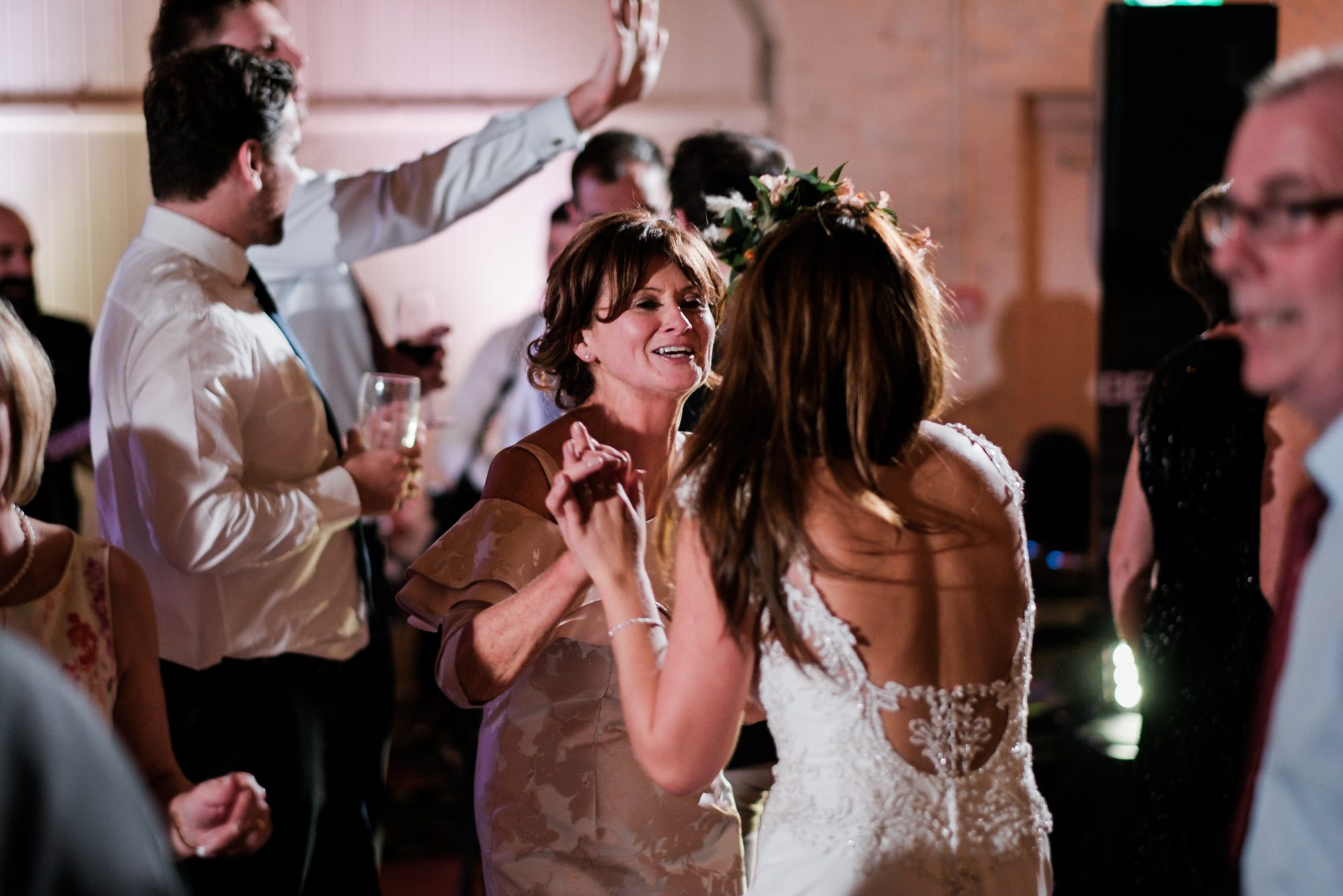 bride and her mother dancing