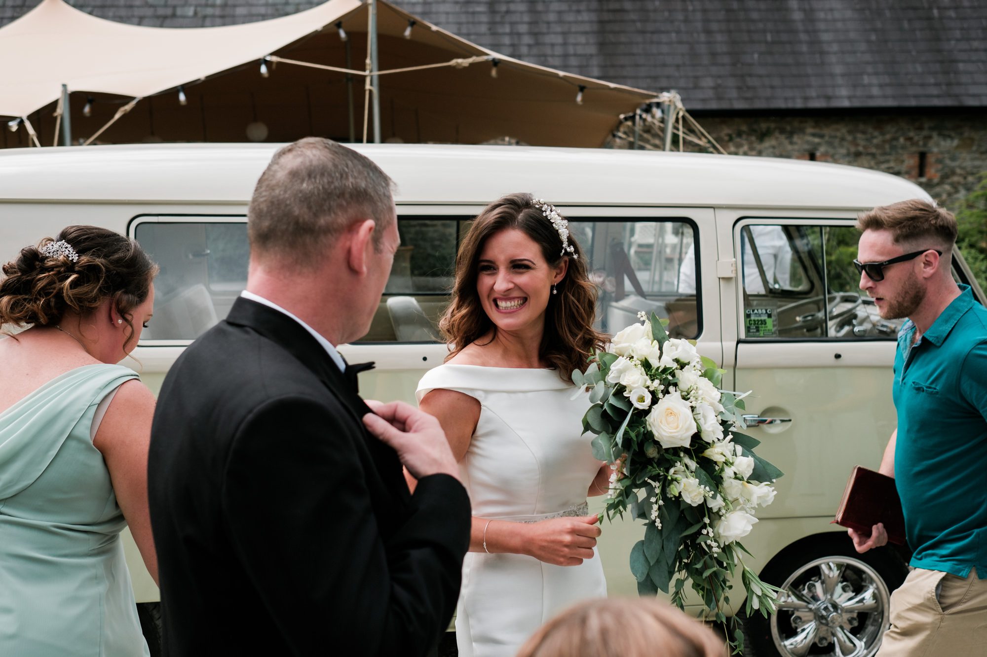 bride and her dad next to VW camper