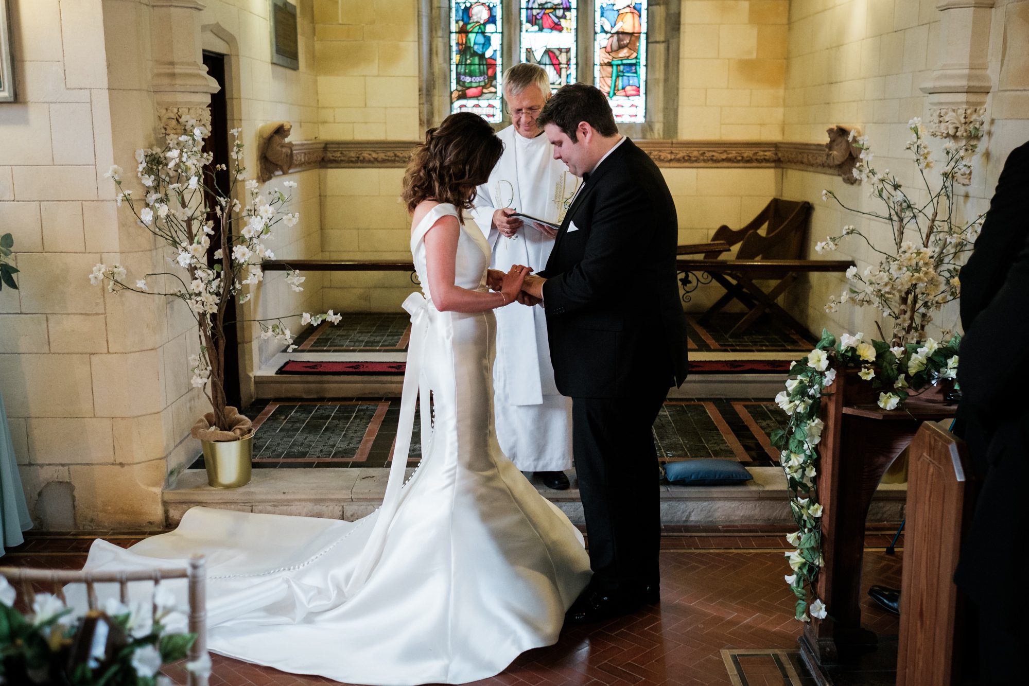 bride and groom during ceremony at Old Court Chapel