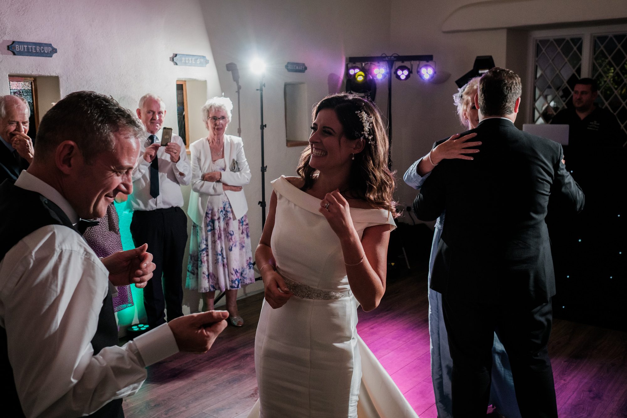 bride and her dad, groom and his mum, on dance floor
